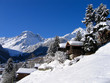 Chalets in a snow white valley Chalets in a snow white valley