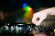 Close-up of deejay’s hand and turntable