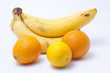 Bananas a lemon and two oranges