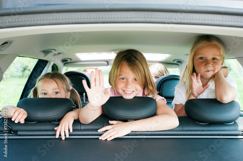 Photo: Family travelling by car Family travelling by car