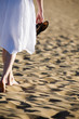 Woman walking on the beach