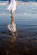 Woman walking on the beach