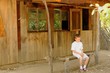 Lonely Boy at Old Cabin