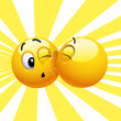 Smiling ball kissing another smiling ball
