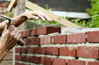 Bricklayer with trowel