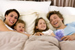 family in bed