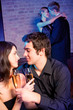 Two amorous couples celebrating together at restaurant Two amorous couples celebrating together at restaurant