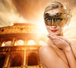 Beautiful woman in front of Colosseum (Rome, Italy)