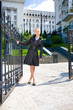 Photo: Beautiful Young Woman in black coat Beautiful Young Woman in black coat