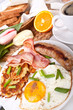 classic breakfast meal - bacon, egg, sausage and hash browns