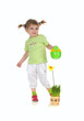 Cute little girl watering the flower Cute little girl watering the flower
