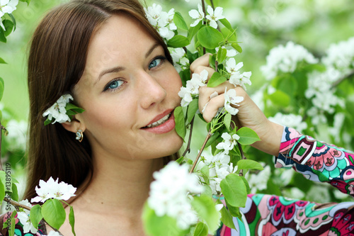 Photo: portrait of young woman in the garden, shallow DOF portrait of young woman in the garden, shallow DOF