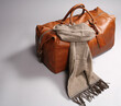 brown leathe bag with scarf