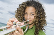 Portrait of a girl playing a trumpet