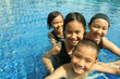 Group of children playing in the pool. Group of children playing in the pool.