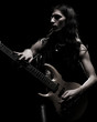 man playing electrical guitar