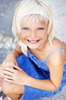 Foto: Young girl watching at the camera Young girl watching at the camera