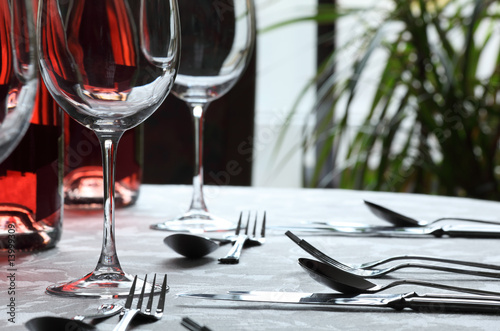 Wine Glasses and cutlery in restaurant
