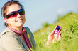 Portrait of the beautiful girl listening to music in ear-phones