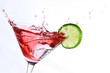 red cocktail with lime on white