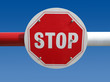 Red stop sign on a barrier. Red stop sign on a barrier.