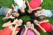 Seven children playing in the park. Seven children playing in the park.