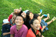 Seven children playing in the park. Seven children playing in the park.