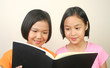 Two girl reading book. Two girl reading book.