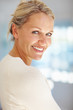 An aged woman with a friendly smile