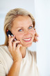 Happy elderly woman speaking on the cellphone