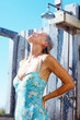 Woman under the shower, outdoors
