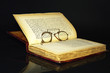 old book and glasses