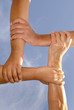 Hands forming an unbreakable chain