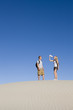 Hikers Drink Water in the Desert
