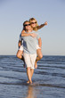 A young happy couple on the beach