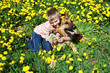 Boy, dog and yellow meadow.