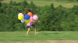 Girl Skipping with Balloons