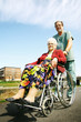 Photo: Male nurse with senior woman in wheelchair Male nurse with senior woman in wheelchair