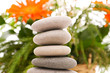 Stack of spa pebbles against blurred background