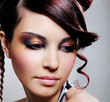 female face with multicoloured eyeshadow