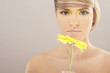 Beautiful woman with a sunflower