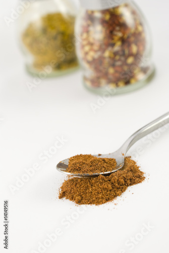 Photo: Silver spoon with chili powder Silver spoon with chili powder