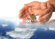 Hands and little house.