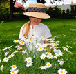 Kind mit Blumen Gärtner