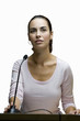 Woman speaking into microphone, cut out