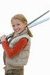 Portrait of young girl carrying paddles, cut out
