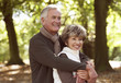 A senior couple embracing in autumn time