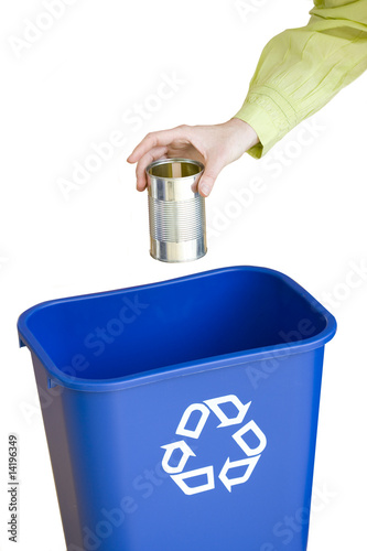Photo: Person putting tin can into recycling bin, close-up of hand, cut out Person putting tin can into recycling bin, close-up of hand, cut out