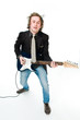 Young man playing electro guitar