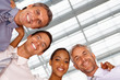 Upward view of business team smiling together